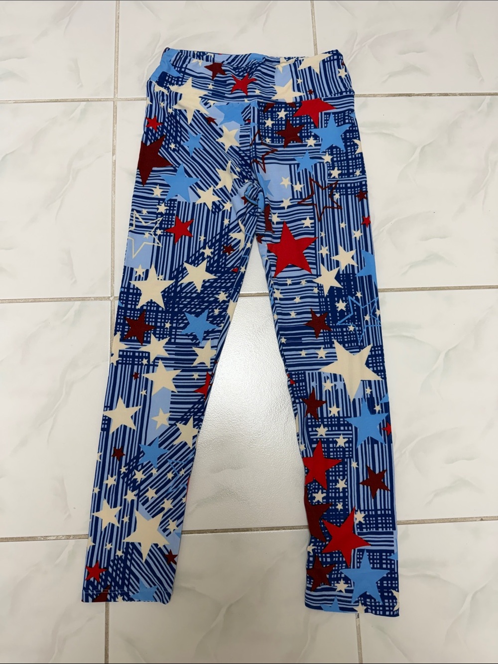 LuLaRoe Blue, Red & Cream Star Pattern Leggings